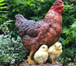 Poule avec ses poussins en résine 35 cm