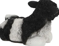 Veau noir et blanc couché en résine (Petit modèle)